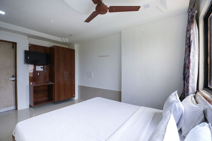 Imagen de la habitación del Hotel Spot On 61734 Janki. Foto 32