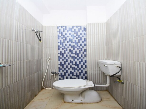 Imagen de la habitación del Hotel Spot On 61734 Janki. Foto 34