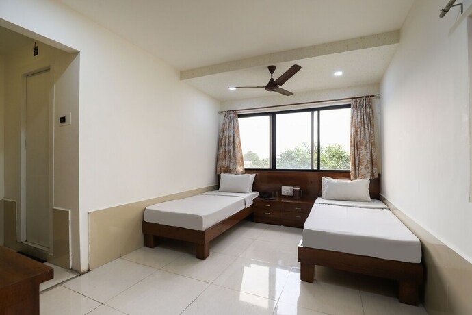 Imagen de la habitación del Hotel Spot On 61734 Janki. Foto 35