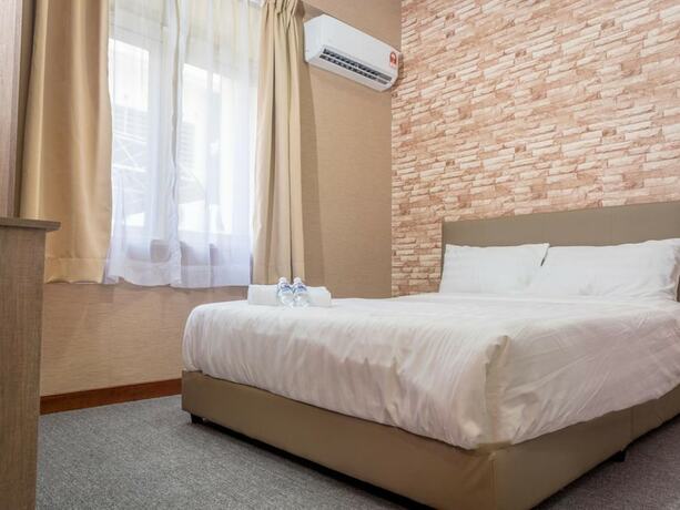 Imagen de la habitación del Hotel Spot On 89645 Ong's Court. Foto 14