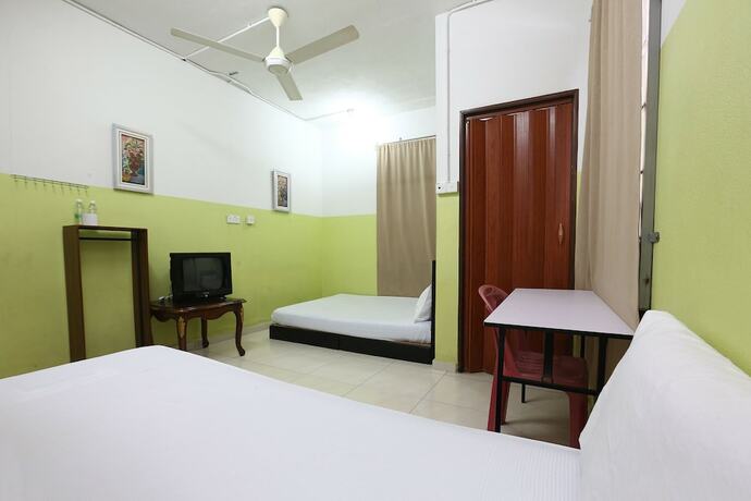 Imagen de la habitación del Hotel Spot On 89925 Thank Q Inn 1. Foto 11