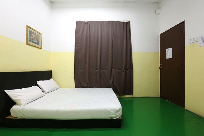 Imagen de la habitación del Hotel Spot On 89925 Thank Q Inn 1. Foto 13