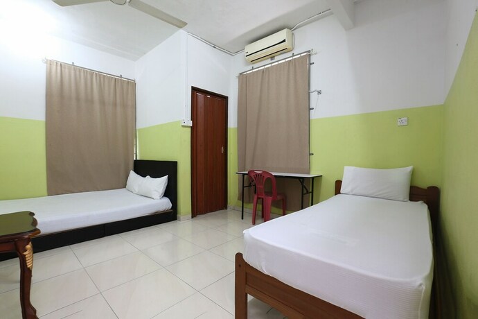 Imagen de la habitación del Hotel Spot On 89925 Thank Q Inn 1. Foto 14