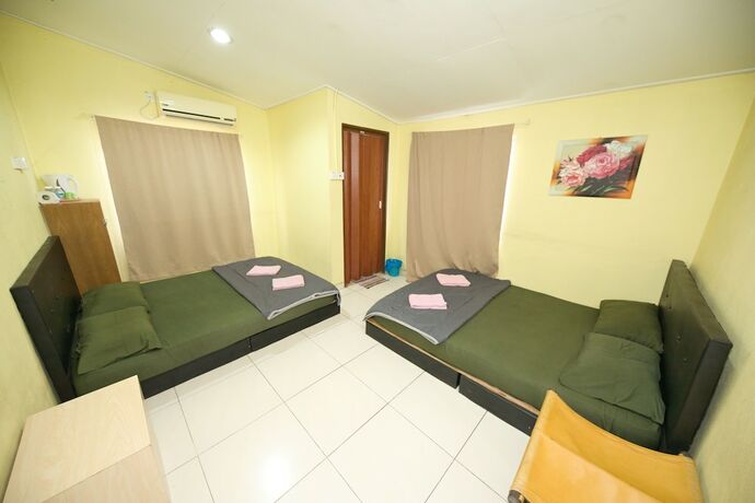 Imagen de la habitación del Hotel Spot On 89925 Thank Q Inn 1. Foto 19