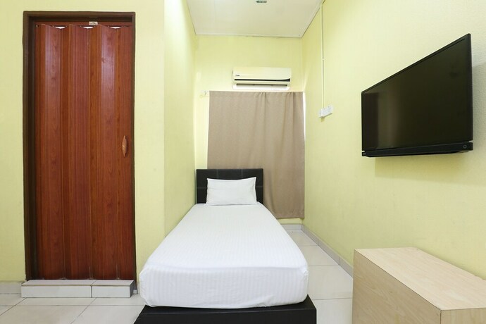 Imagen de la habitación del Hotel Spot On 89925 Thank Q Inn 1. Foto 20