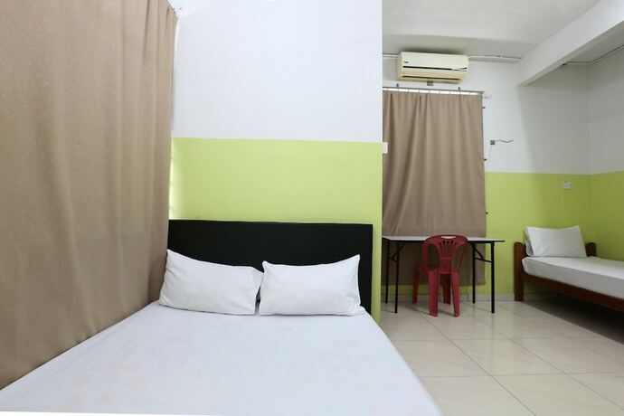 Imagen de la habitación del Hotel Spot On 89925 Thank Q Inn 1. Foto 23