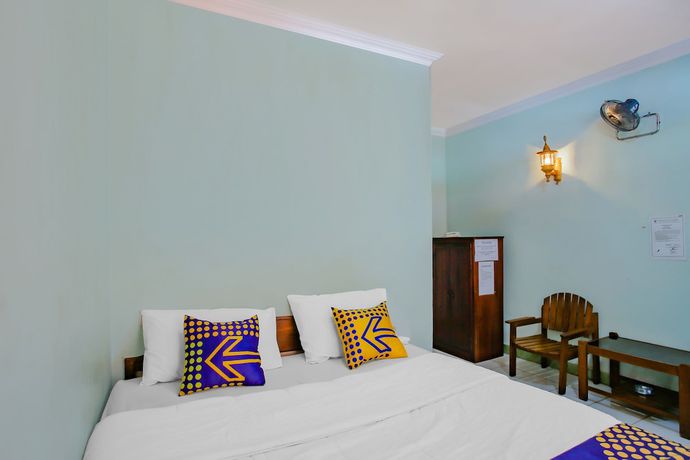 Imagen de la habitación del Hotel Spot On 90100 Kediri Bandungan. Foto 4