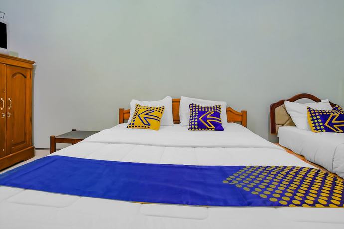 Imagen de la habitación del Hotel Spot On 90100 Kediri Bandungan. Foto 18