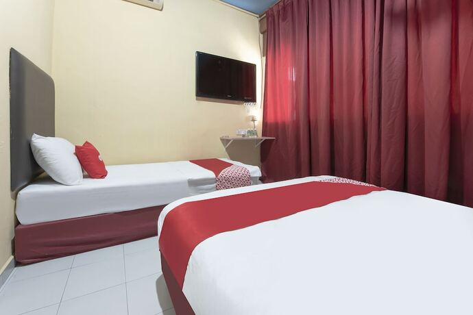 Imagen general del Hotel Spot On 90305 Hen Hen. Foto 3