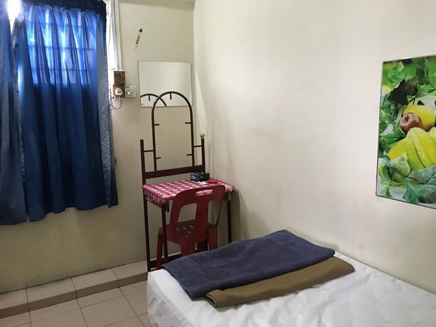 Imagen de la habitación del Hotel Spot On 90625 Super Green Grass. Foto 2