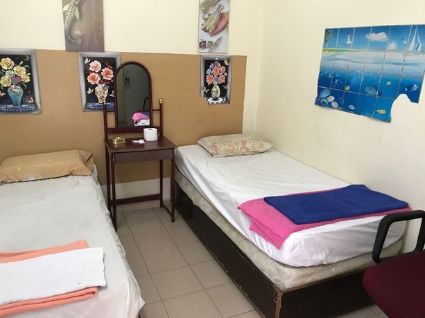 Imagen de la habitación del Hotel Spot On 90625 Super Green Grass. Foto 4