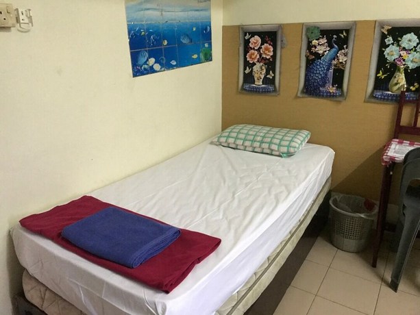 Imagen de la habitación del Hotel Spot On 90625 Super Green Grass. Foto 6