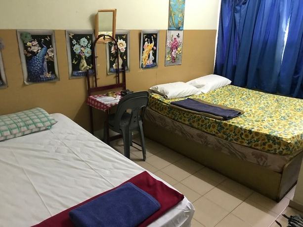 Imagen de la habitación del Hotel Spot On 90625 Super Green Grass. Foto 11