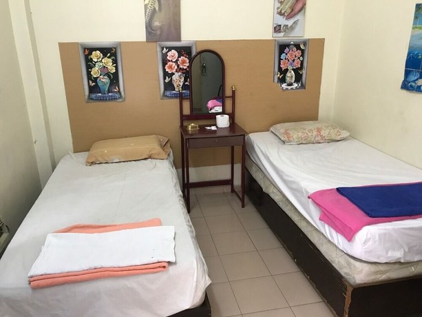 Imagen de la habitación del Hotel Spot On 90625 Super Green Grass. Foto 13