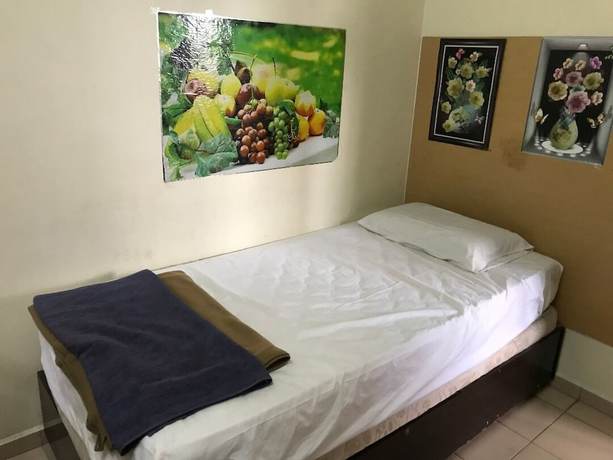 Imagen de la habitación del Hotel Spot On 90625 Super Green Grass. Foto 16