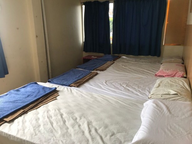 Imagen de la habitación del Hotel Spot On 90625 Super Green Grass. Foto 17