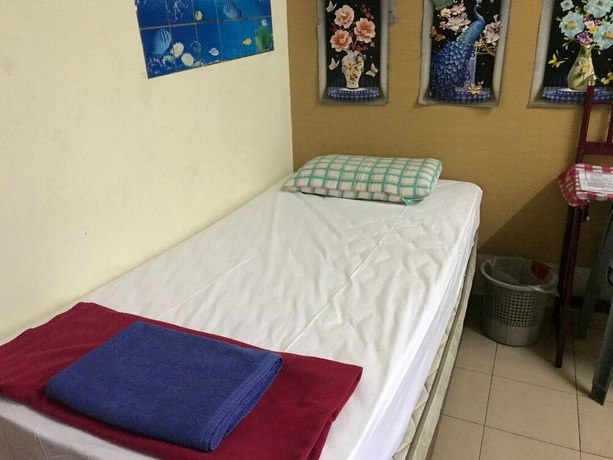 Imagen de la habitación del Hotel Spot On 90625 Super Green Grass. Foto 18