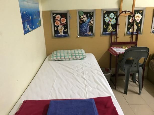 Imagen de la habitación del Hotel Spot On 90625 Super Green Grass. Foto 19