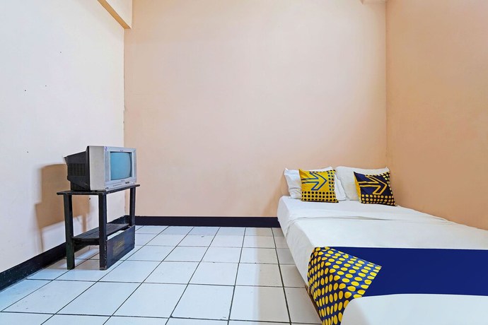 Imagen de la habitación del Hotel Spot On 91367 Rumah Bundo Syariah. Foto 4