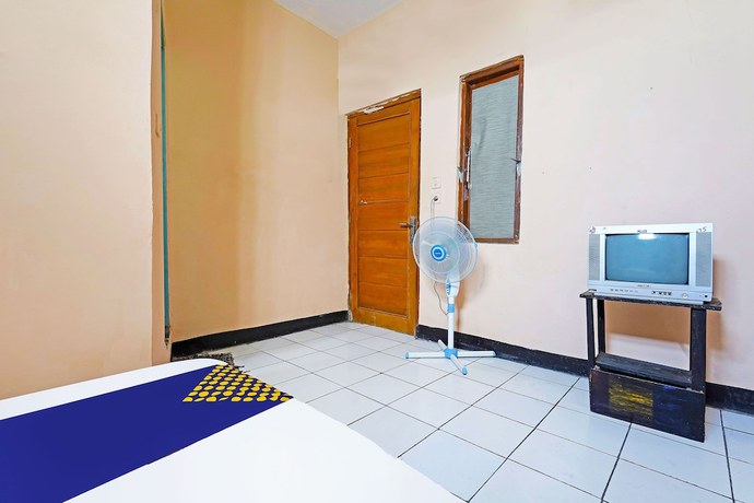 Imagen de la habitación del Hotel Spot On 91367 Rumah Bundo Syariah. Foto 5
