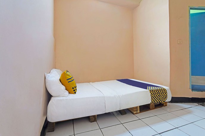 Imagen de la habitación del Hotel Spot On 91367 Rumah Bundo Syariah. Foto 6