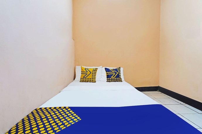Imagen de la habitación del Hotel Spot On 91367 Rumah Bundo Syariah. Foto 7