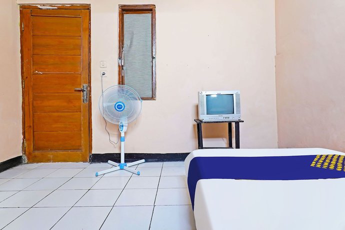 Imagen de la habitación del Hotel Spot On 91367 Rumah Bundo Syariah. Foto 13