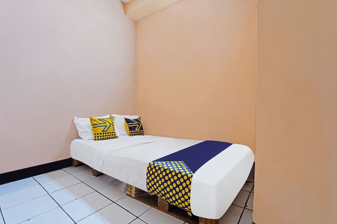 Imagen de la habitación del Hotel Spot On 91367 Rumah Bundo Syariah. Foto 14