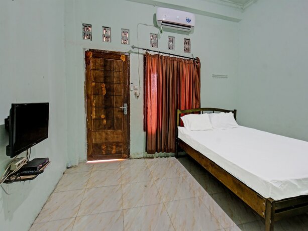 Imagen general del Hotel Spot On 91771 Homestay Bang Haji. Foto 11
