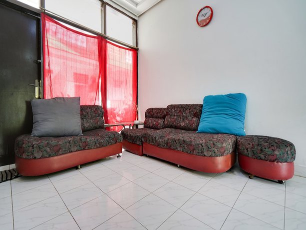 Imagen de los interiores del Hotel Spot On 91775 Pondok 14 Syariah. Foto 14