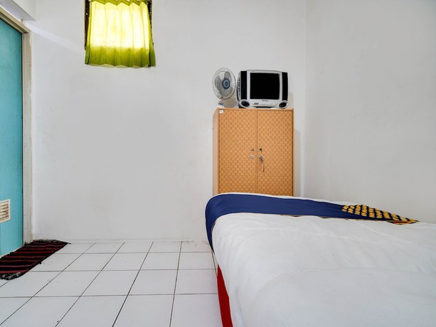 Imagen de la habitación del Hotel Spot On 91775 Pondok 14 Syariah. Foto 4