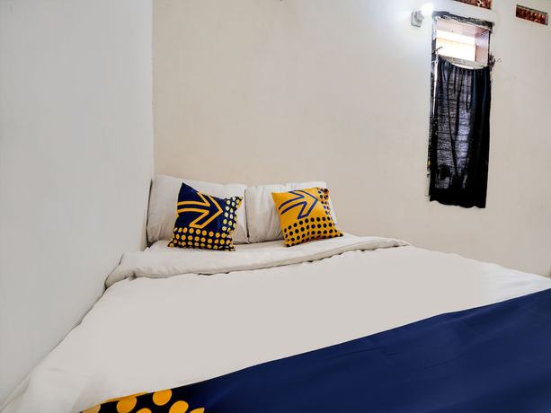 Imagen de la habitación del Hotel Spot On 91775 Pondok 14 Syariah. Foto 6