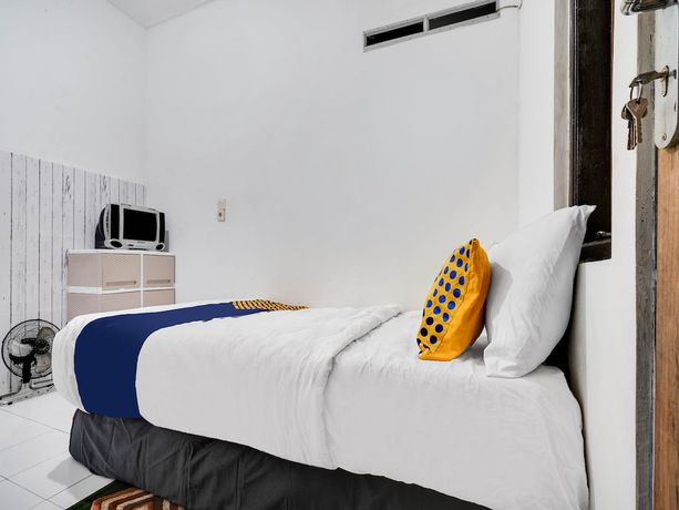 Imagen de la habitación del Hotel Spot On 91775 Pondok 14 Syariah. Foto 8
