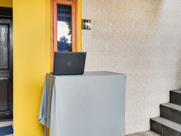 Imagen de los interiores del Hotel Spot On 91775 Pondok 14 Syariah. Foto 19