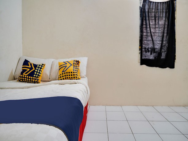 Imagen de la habitación del Hotel Spot On 91775 Pondok 14 Syariah. Foto 13