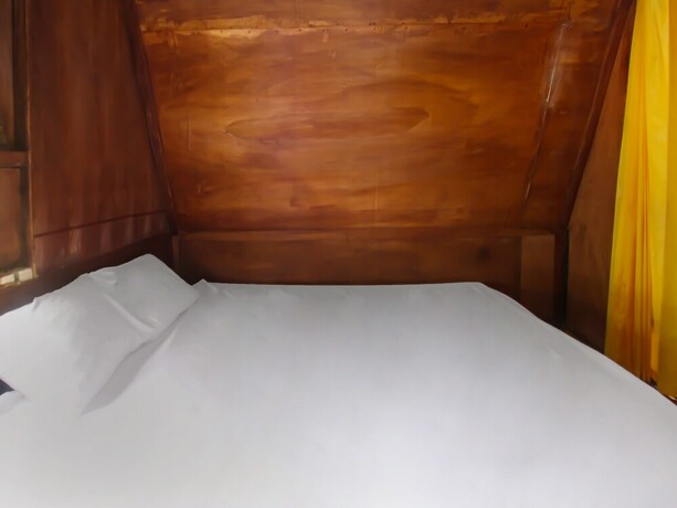 Imagen de la habitación del Hotel Spot On 92462 Awenk Homestay. Foto 21