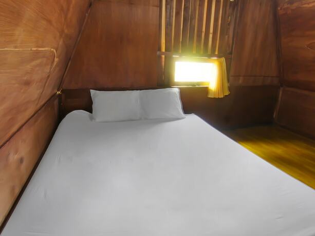 Imagen de la habitación del Hotel Spot On 92462 Awenk Homestay. Foto 22