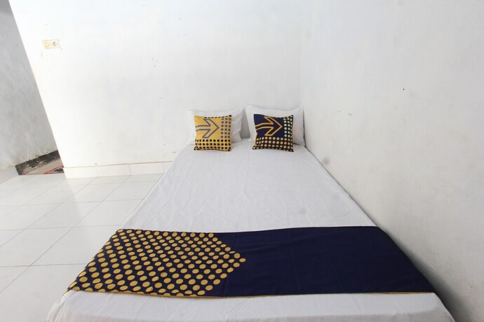 Imagen de la habitación del Hotel Spot On 93441 Gians Homestay. Foto 10