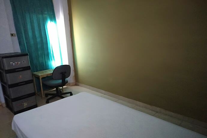 Imagen de la habitación del Hotel Spot On 93464 Penginapan Tulimario. Foto 18