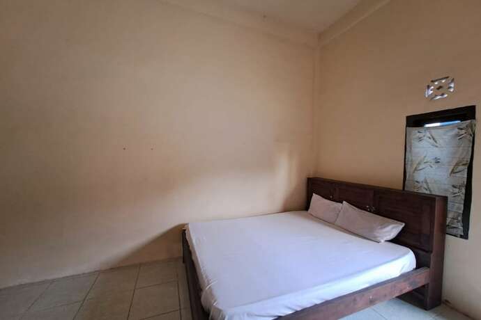 Imagen de la habitación del Hotel Spot On 93465 Archa Guest House Syariah. Foto 27