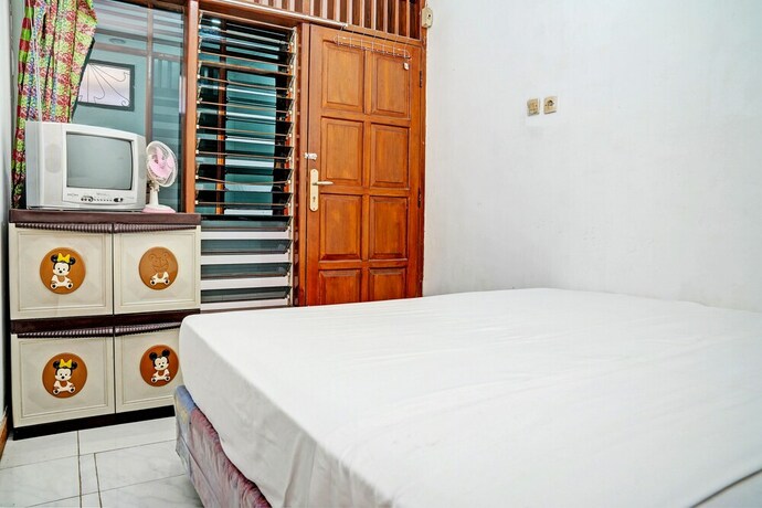 Imagen de la habitación del Hotel Spot On 93475 Garuda Homestay Syariah. Foto 19