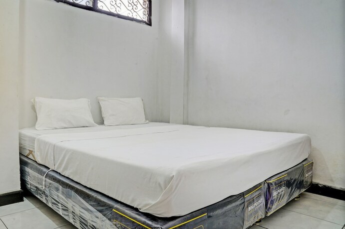 Imagen de la habitación del Hotel Spot On 93475 Garuda Homestay Syariah. Foto 20