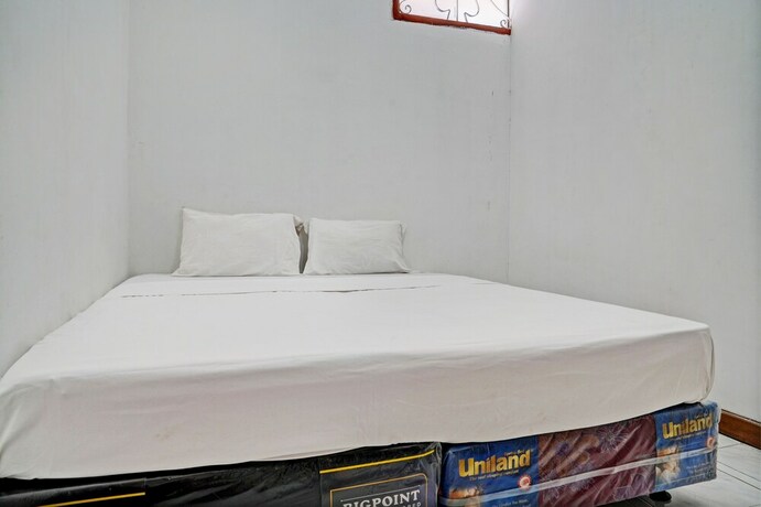 Imagen de la habitación del Hotel Spot On 93475 Garuda Homestay Syariah. Foto 22
