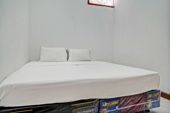 Imagen de la habitación del Hotel Spot On 93475 Garuda Homestay Syariah. Foto 23