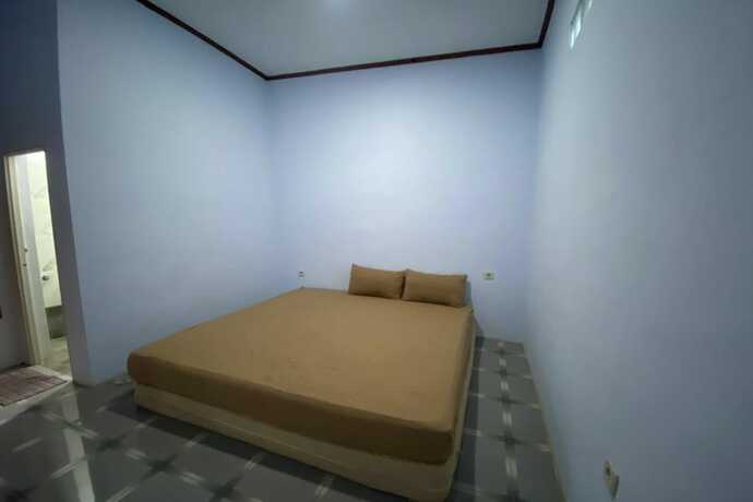 Imagen de la habitación del Hotel Spot On 93510 Penginapan Melati Tanjung. Foto 20