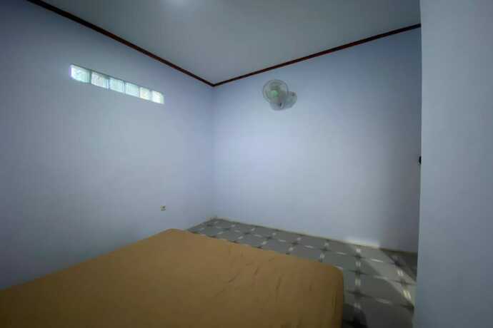 Imagen de la habitación del Hotel Spot On 93510 Penginapan Melati Tanjung. Foto 21