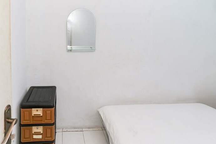 Imagen de la habitación del Hotel Spot On 93515 Pulo Gebang Guest House. Foto 17