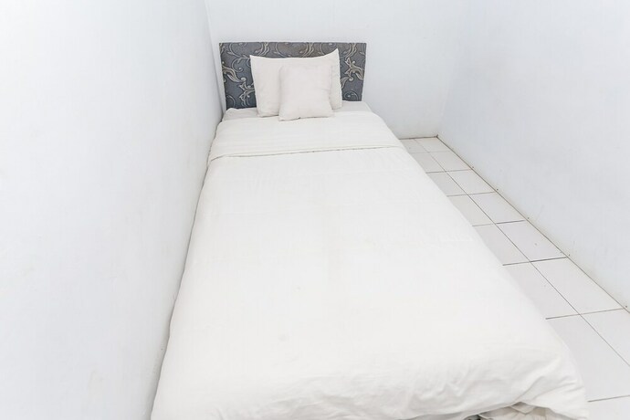 Imagen de la habitación del Hotel Spot On 93515 Pulo Gebang Guest House. Foto 18