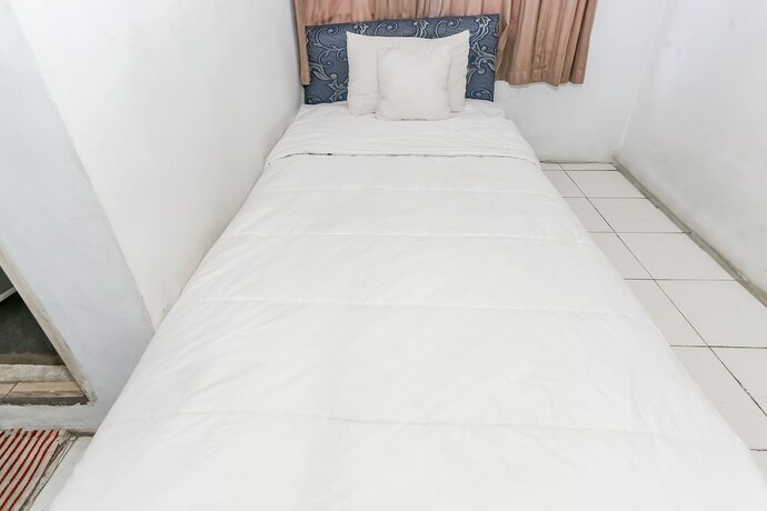 Imagen de la habitación del Hotel Spot On 93515 Pulo Gebang Guest House. Foto 19