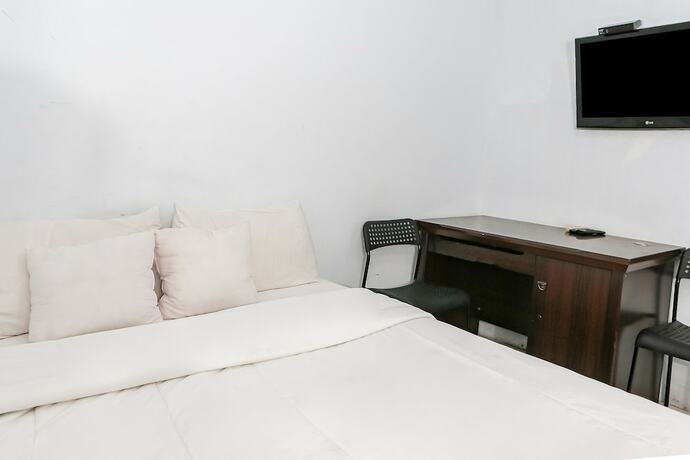 Imagen de la habitación del Hotel Spot On 93515 Pulo Gebang Guest House. Foto 23